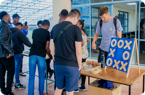 Attendees at a sponsor booth during Fluttercon Kenya